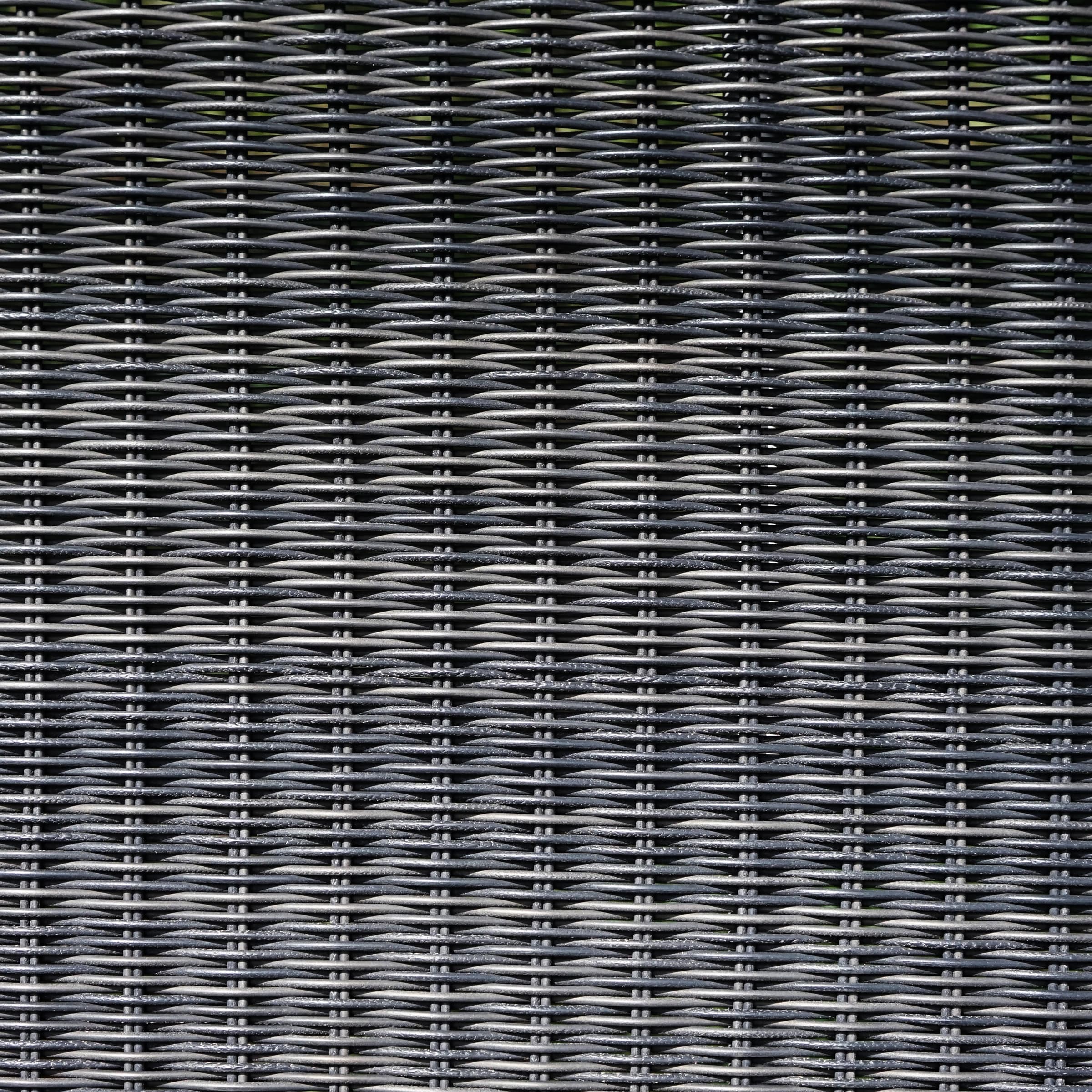 Close-up of dark woven material with a dense horizontal pattern.